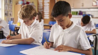 Male students working in the class