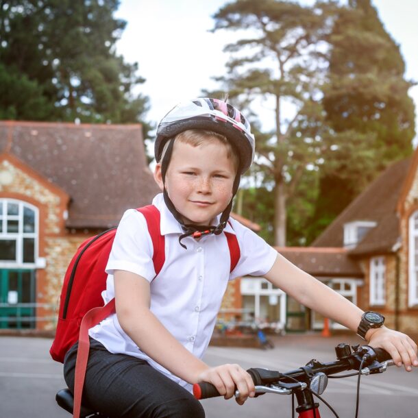 School Boy Riding Bike